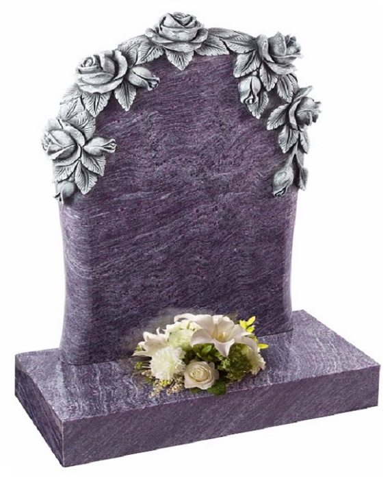 Memorial headstone and base in Bahama blue granite with hand carved design
